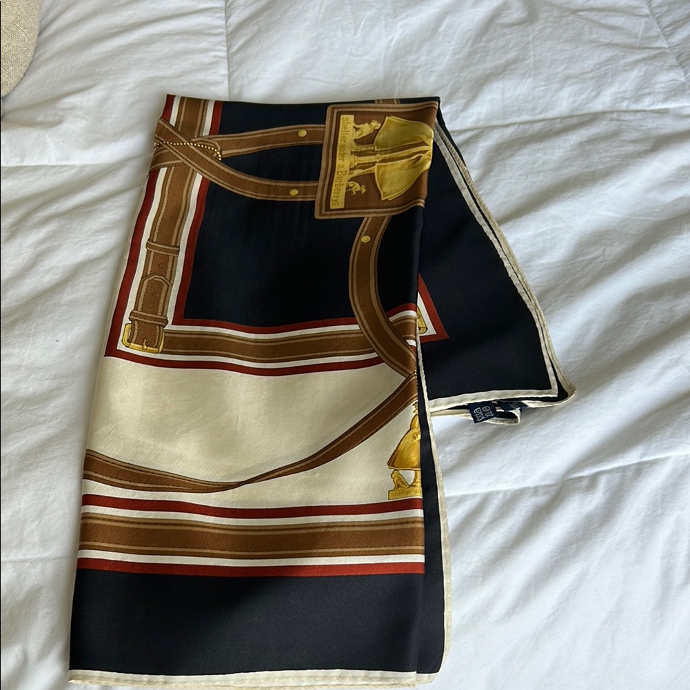 Burberry’s “Shelter Under A Burberry’s “ Navy And Gold Scarf